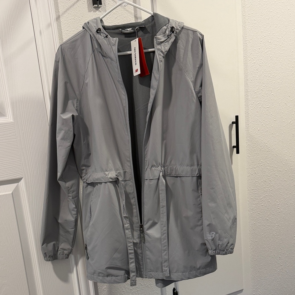New Balance NWT  Light Gray all weather Jacket. Water & Wind Resistance